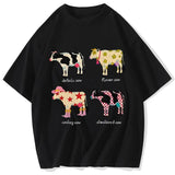 2 Flat lay of black cartoon cow print graphic tee showing full print and O-neck collar
