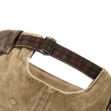 Model wearing acid wash brimless cap, back view