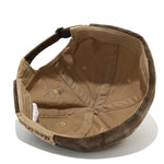Model wearing acid wash brimless cotton cap, front view