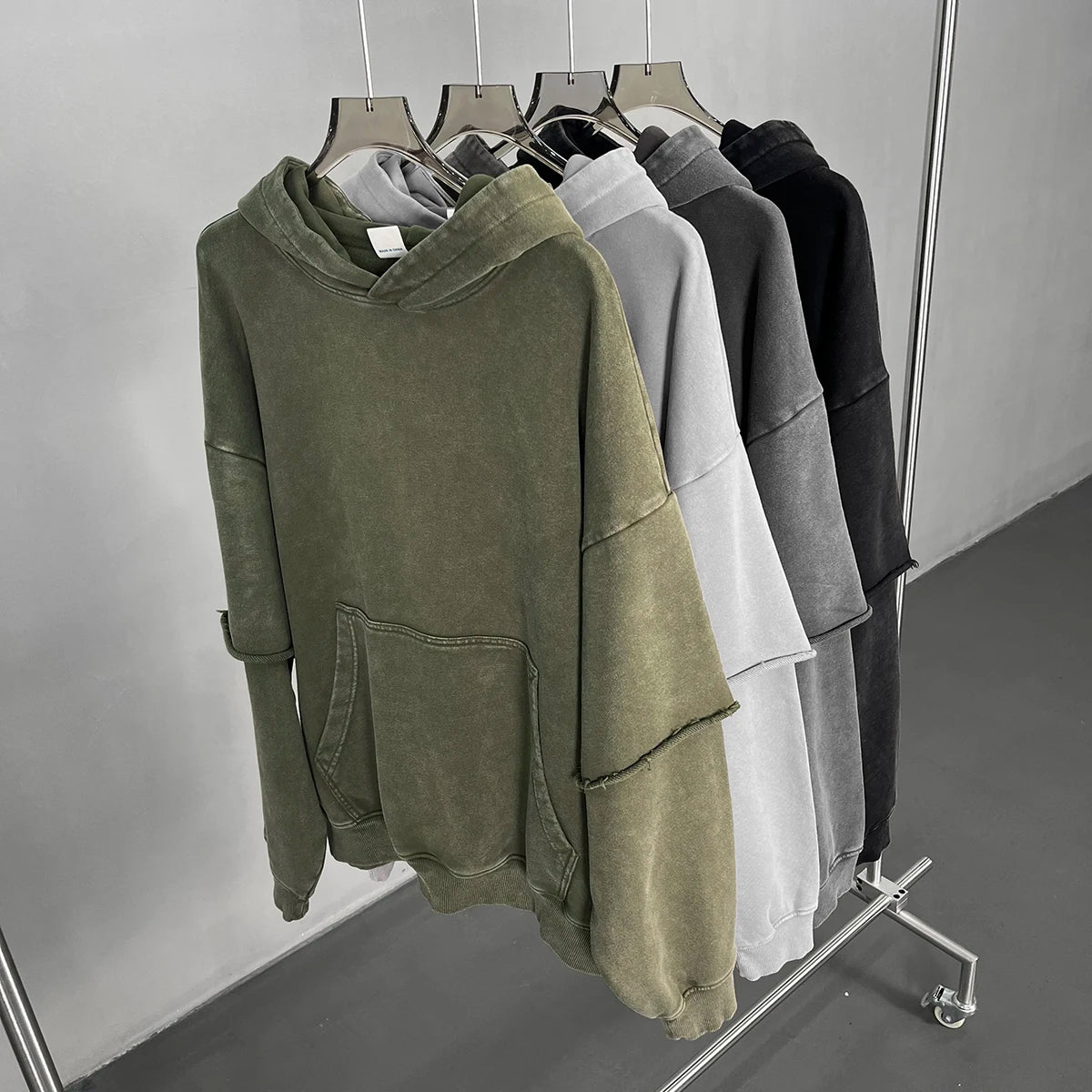 Acid wash hoodie — 3D chest pocket detail