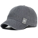Acid wash short brim baseball cap — detail view