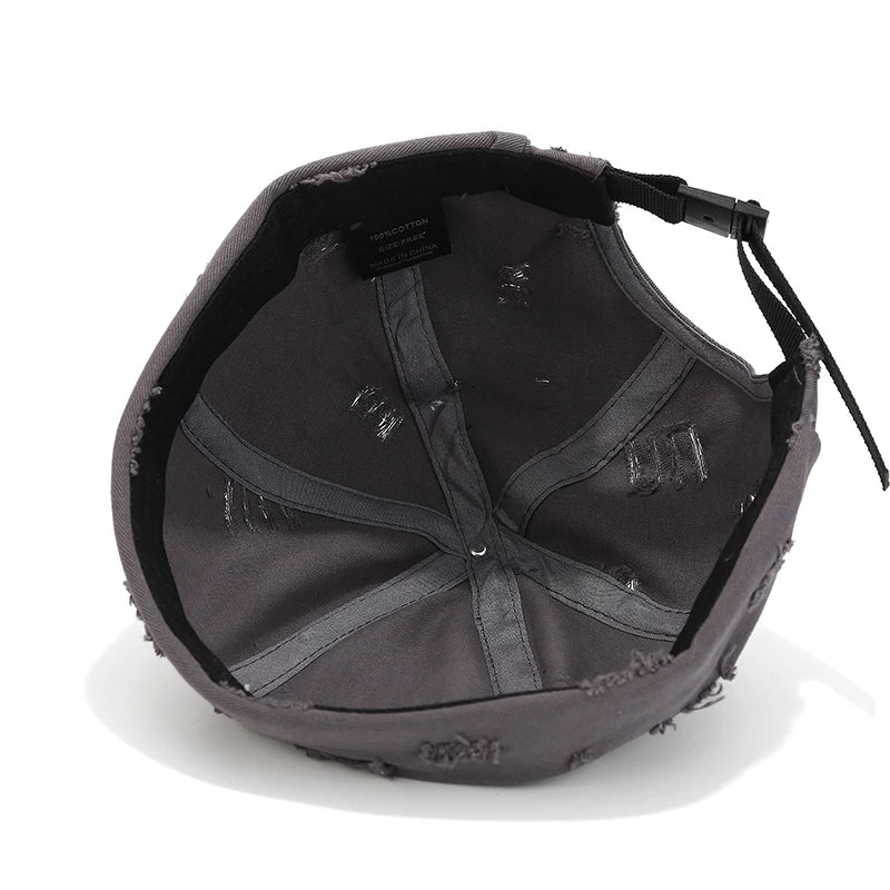 Adjustable brimless docker hat showing back adjuster