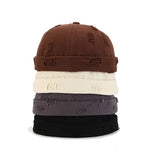 Adjustable brimless docker hat, side profile view