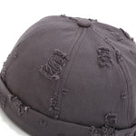 Top-down view of adjustable brimless docker cap