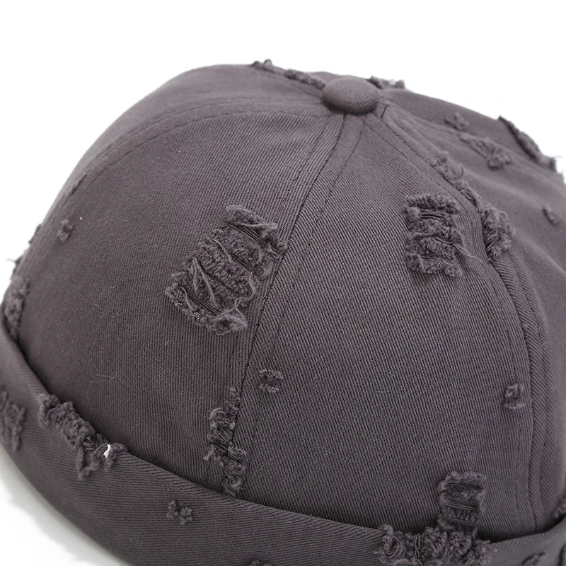 Top-down view of adjustable brimless docker cap