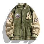 Green varsity jacket with patches on a white background