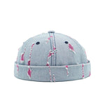 B-Light Blue Model wearing colorful denim docker cap