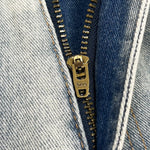 Baggy distressed denim shorts, distressing detail