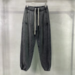 Men's baggy washed fleece sweatpants — worn front view