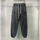 Men's baggy washed fleece sweatpants — worn front view
