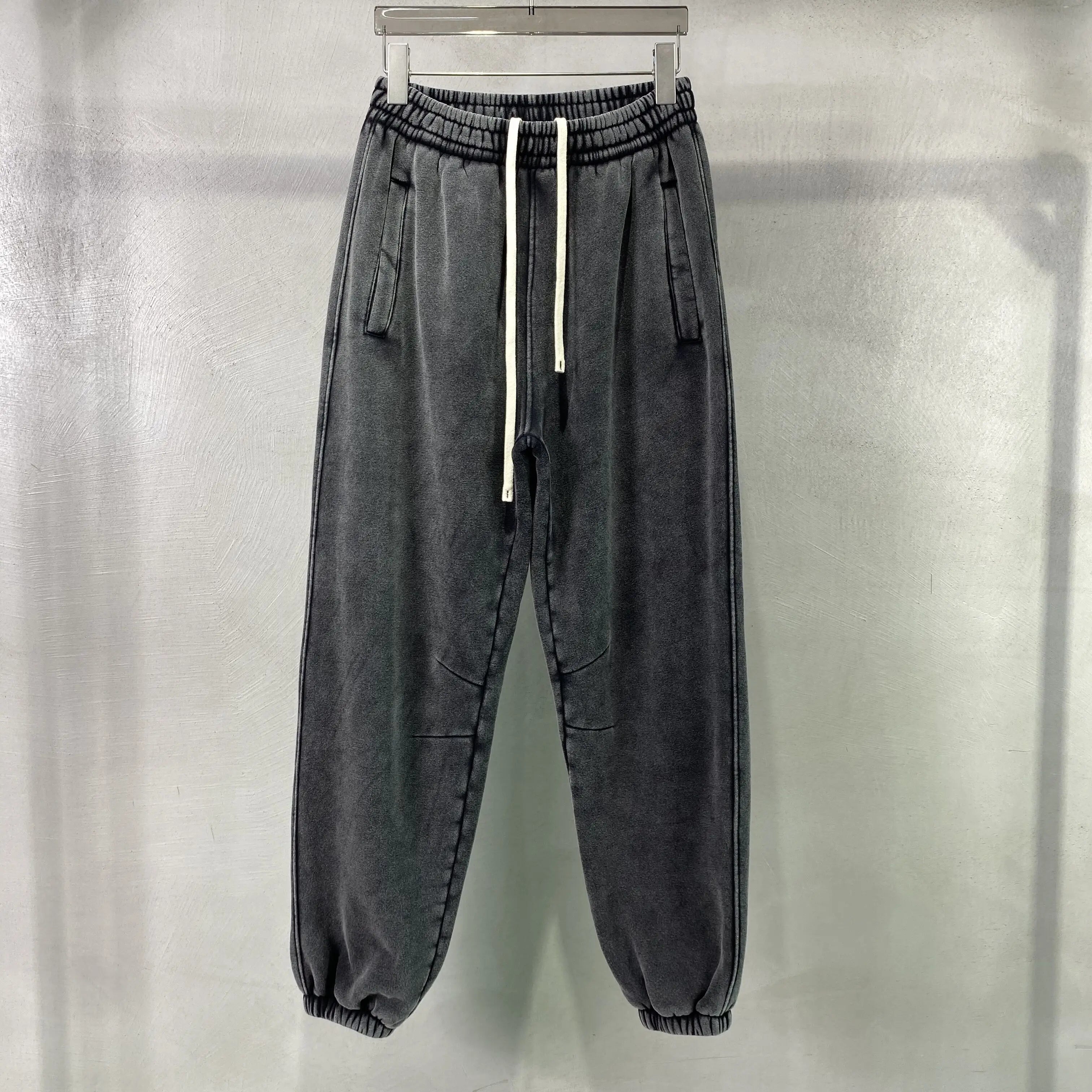 Men's baggy washed fleece sweatpants — worn front view
