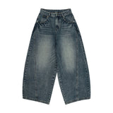 Baggy wide-leg denim jeans, styled on model