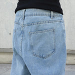Baggy wide-leg jeans on model, front