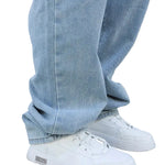 Baggy wide-leg jeans on model, side