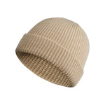Beige knit beanie on a white background