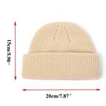 Beige knit beanie with measurements on a white background