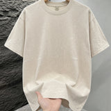 Beige Mineral washed oversized graphic tee, lifestyle shot 5