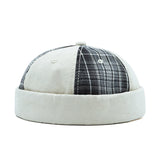 Beige Plaid docker cap worn, front lifestyle view
