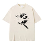 Beige Model wearing smoking cat graphic tee — on-body front view