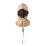 Beige knitted balaclava on a white background