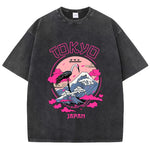 Black Women's acid wash distressed cartoon graphic tee, front view