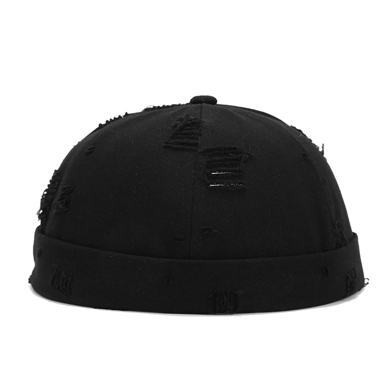 Black Model wearing brimless docker hat, front-facing