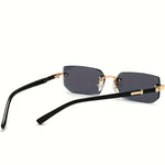 Sunglasses with black frames and dark lenses on a white background