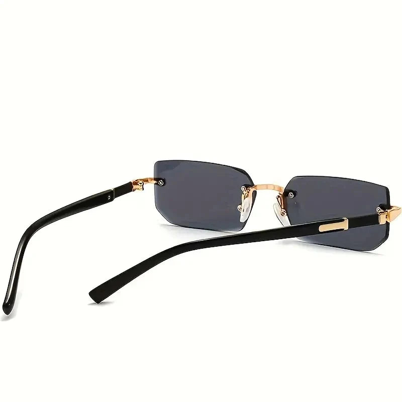 Sunglasses with black frames and dark lenses on a white background