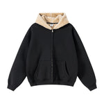 Black hoodie with beige fleece lining on a white background