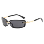 Sunglasses with black lenses and gold frames on a white background