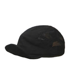 Black cap with mesh back on an open book