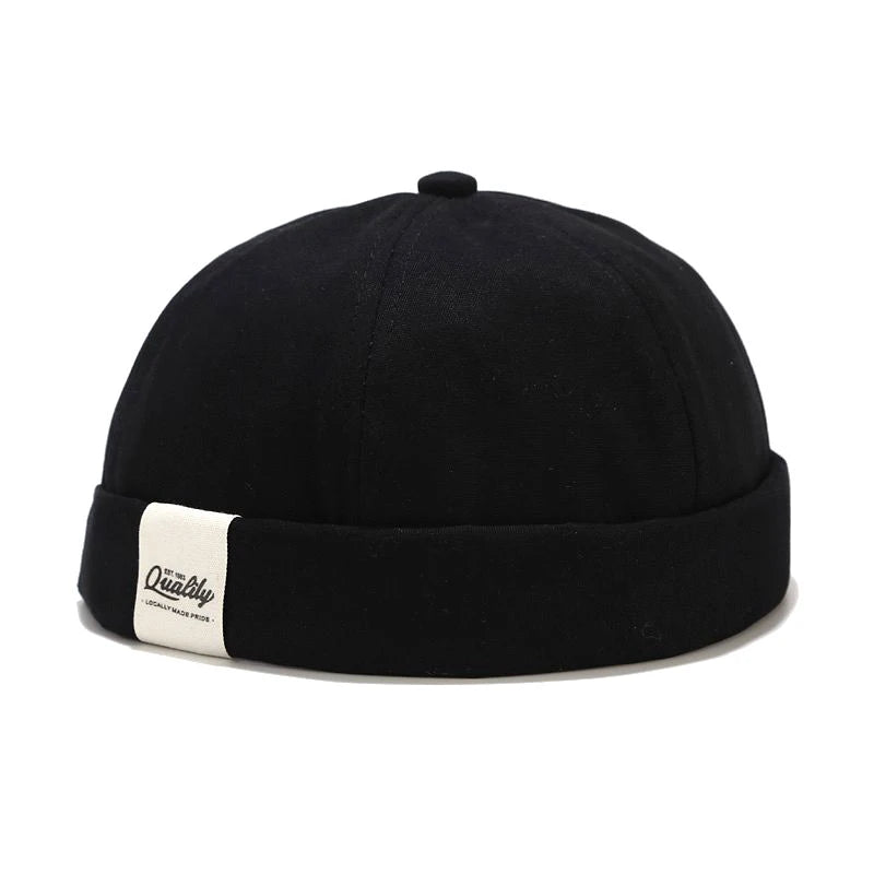 Black Brimless cotton skull cap, flat lay