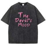 Black Devil's Mood washed oversized graphic tee — flat lay showing distressed print and crew neck