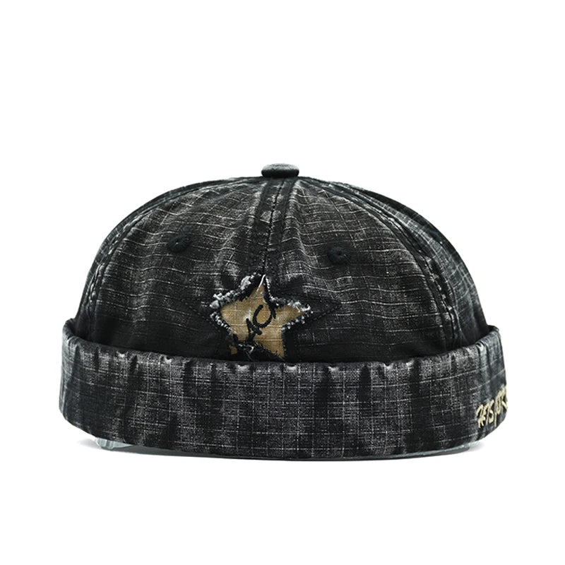 Black Distressed star brimless hat worn, back view