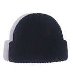 Black knit beanie on a white background