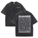 Black Oversized vintage wash graphic tee — worn back view