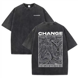 Black Oversized vintage wash graphic tee — worn back view