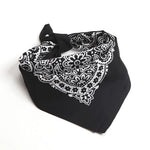 Black Paisley bandana flat lay at an angle