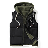 Black puffer vest with green hood on a white background