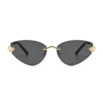 Sunglasses with gold accents on a white background