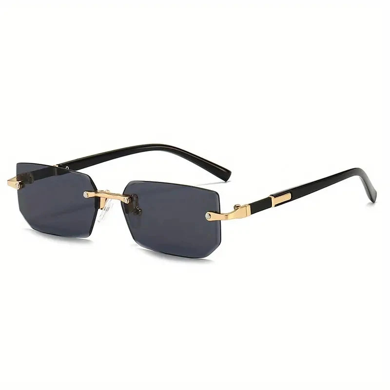 Sunglasses with black and gold frame on a white background