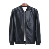 Black leather jacket on a hanger against a white background