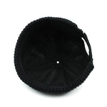 Black knit beanie on a white background