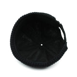 Black knit beanie on a white background