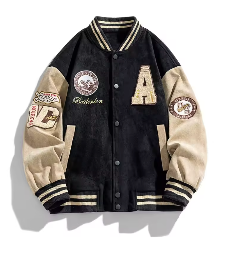 Black varsity jacket with beige sleeves and multiple patches on a white background
