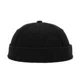 Black beanie hat on a white background