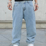 Blue Baggy wide-leg jeans on model, full length