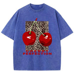 Blue Loose O-neck cherry leopard print tee worn by model, angled view