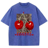 Blue Loose O-neck cherry leopard print tee worn by model, angled view