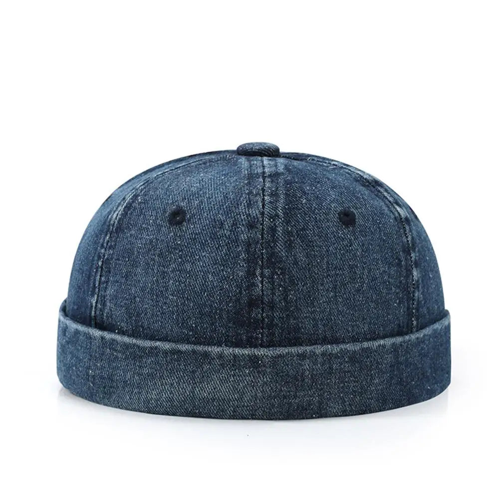 Blue denim cap on a white background